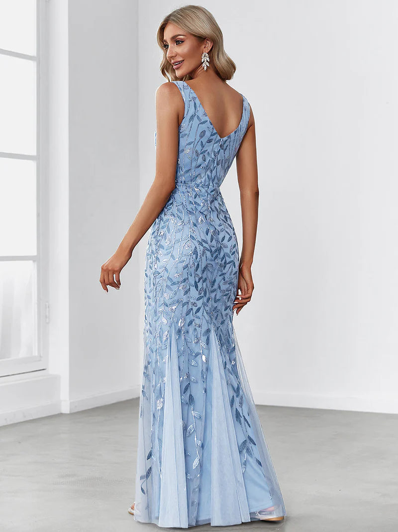 Sky blue formal dress with fishtail and sequins.
