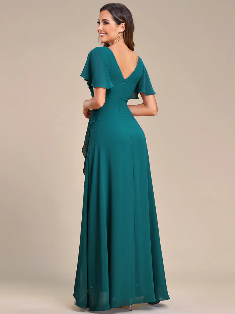 Teal bridesmaid dress with high low ruffle and chiffon.