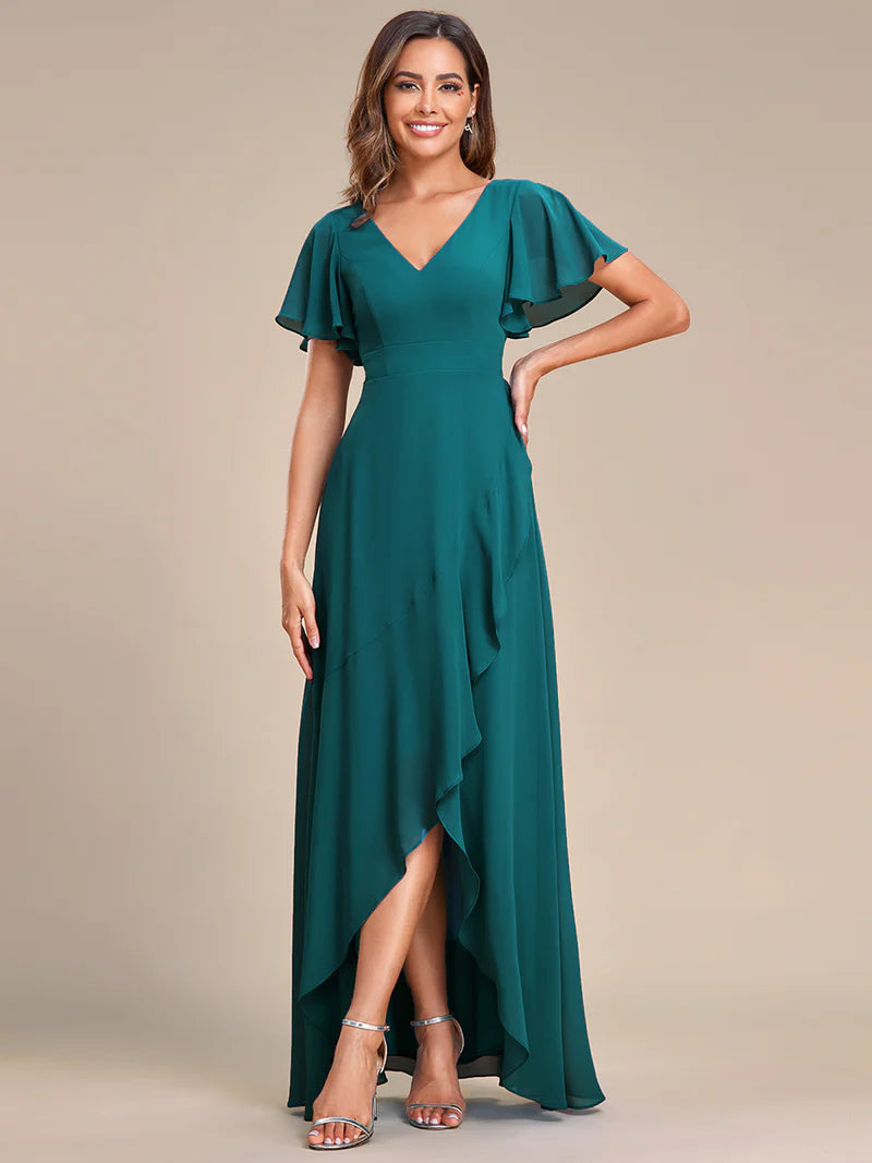 Teal bridesmaid dress with high low ruffle and chiffon.
