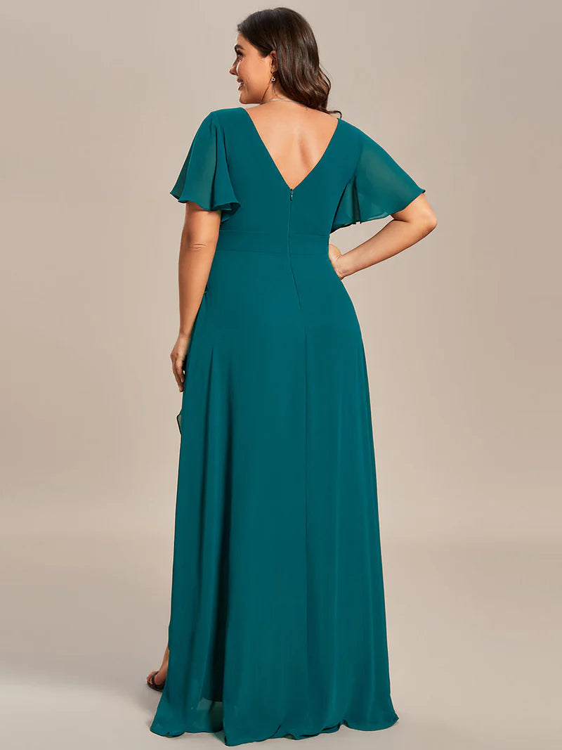 Teal plus sized bridesmaid dress with high low ruffle and chiffon.