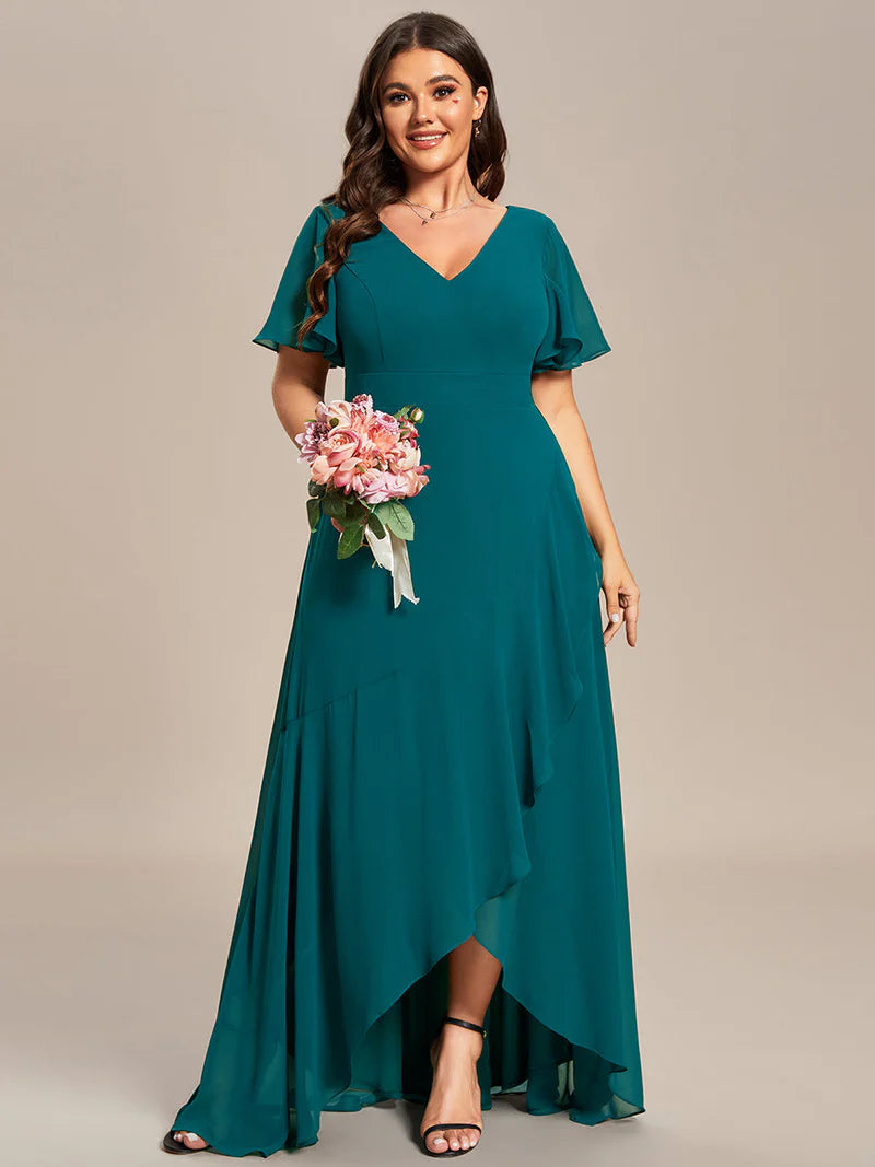 Teal plus sized bridesmaid dress with high low ruffle and chiffon.