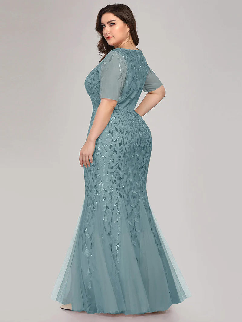 Teal Plus Size Mother of the bride or formal dress, short sleeve with tulle, lace and sequin detailing.