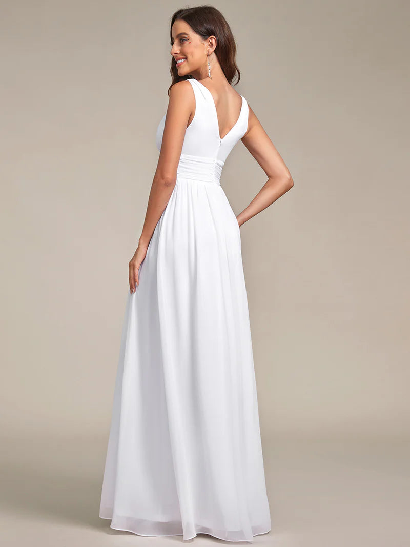 White bridesmaid dress with double v-neck and chiffon.