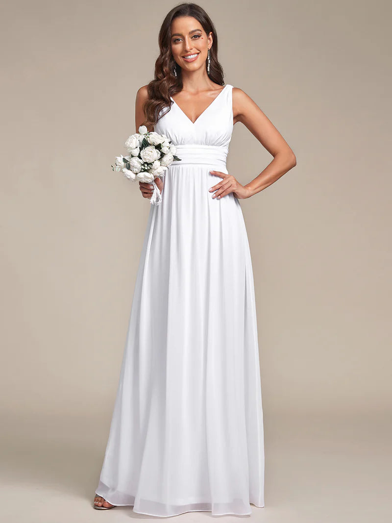 White bridesmaid dress with double v-neck and chiffon.