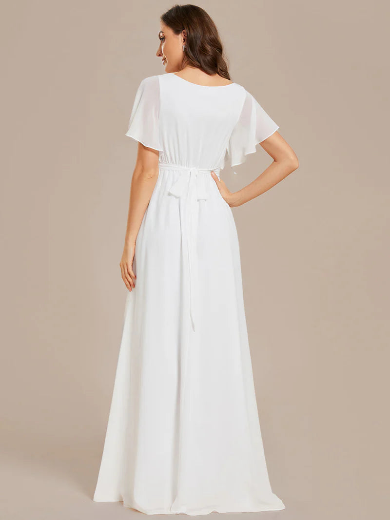 White bridesmaid dress with v-neck and a-line.