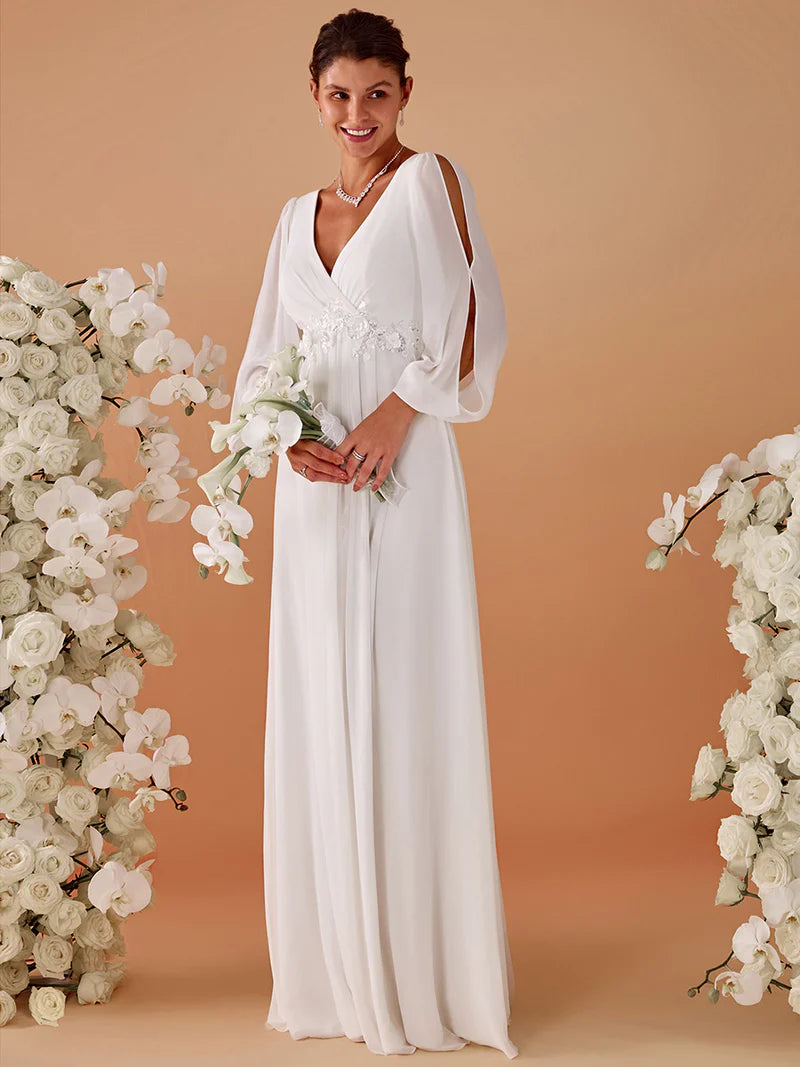 White long sleeve wedding dress with applique detail.