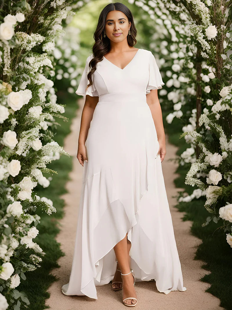 White plus sized bridesmaid dress with high low ruffle and chiffon.