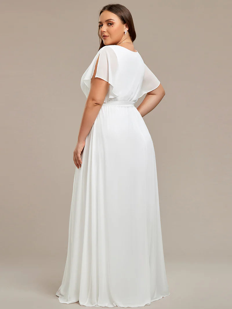 White plus sized bridesmaid dress with v-neck and a-line.