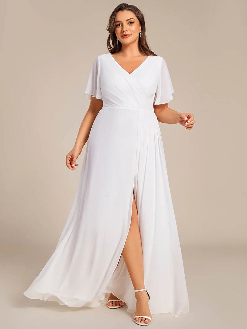 White plus size formal dress with sleeves and a hidden split.