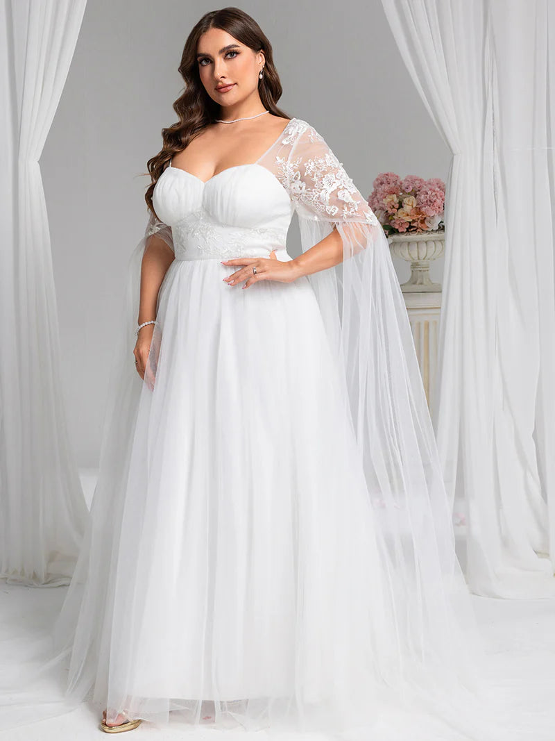 White plus size wedding dress with Long lace and chiffon sleeves.