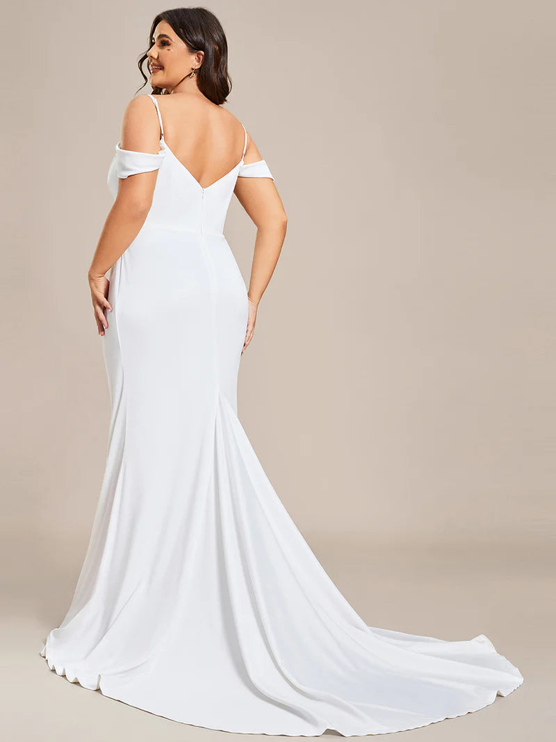 White plus size wedding dress, off the shoulder with spaghetti straps and mermaid tail.
