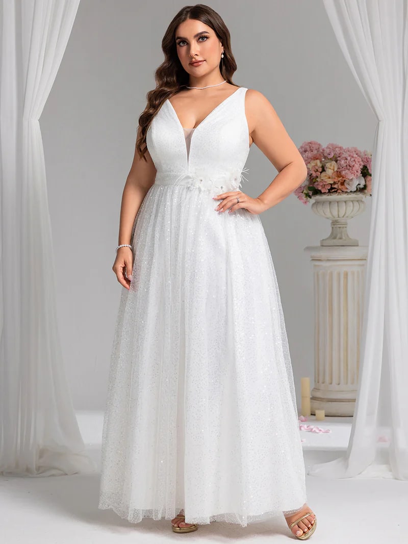 White plus size wedding dress with tulle, a v-neck sequins and floor length.