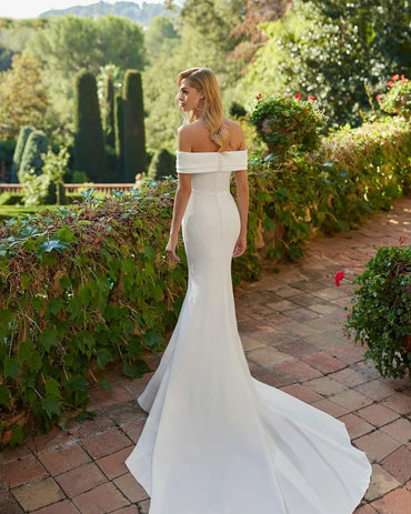 White wedding dress with off the shoulder mermaid tail and satin. Available in plus size.