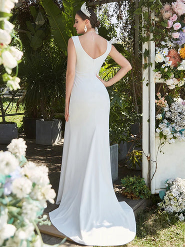 White wedding dress sleeveless, split and v-neck.