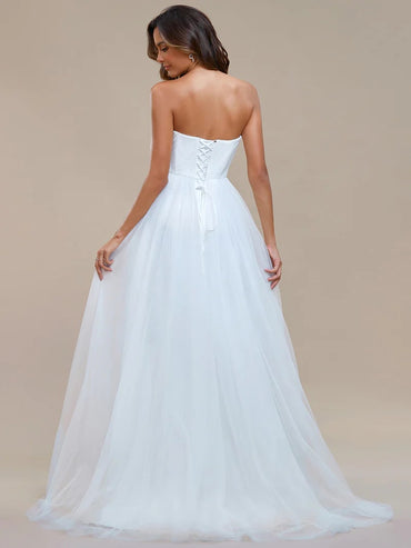 White wedding  strapless dress with tulle skirt, lace top and lace up back.