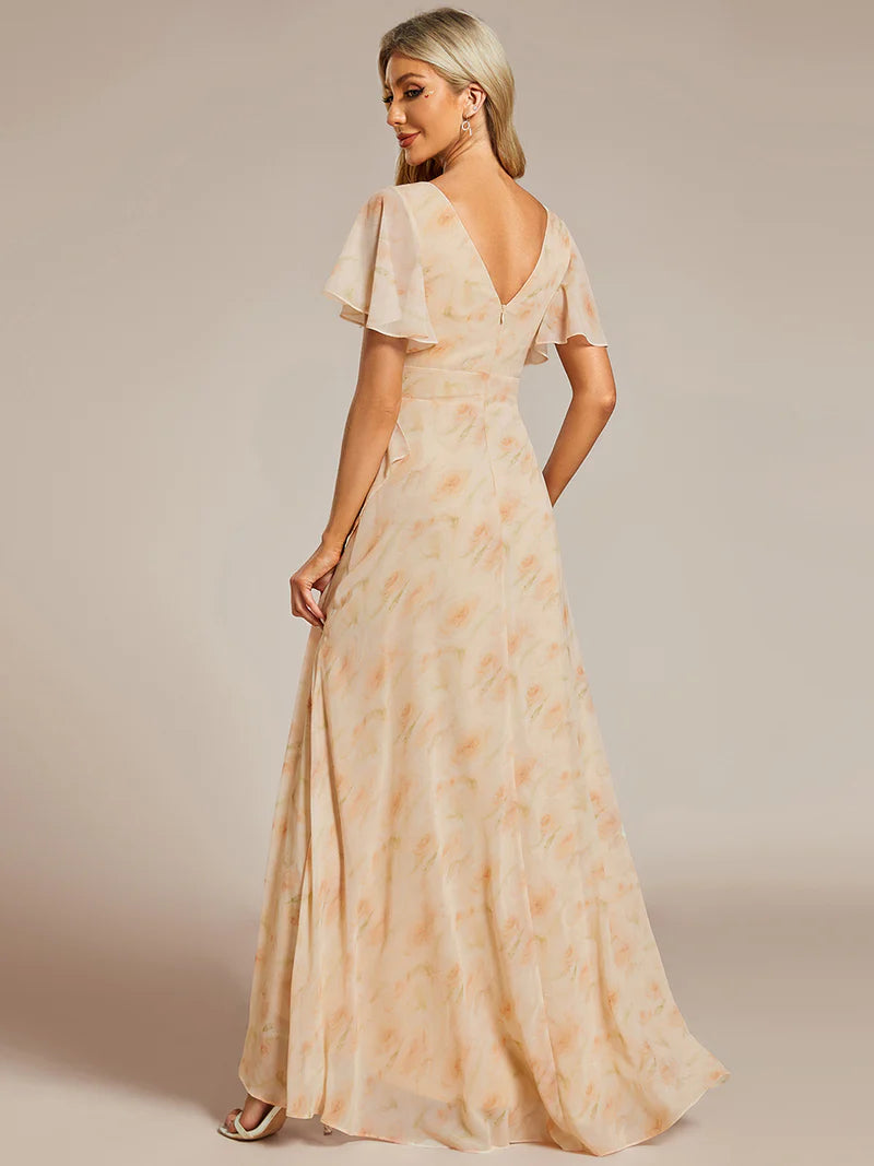 Apricot floral bridesmaid dress with high low ruffle and chiffon.