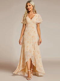 Apricot floral bridesmaid or mother of the bride dress with high low ruffle and chiffon.