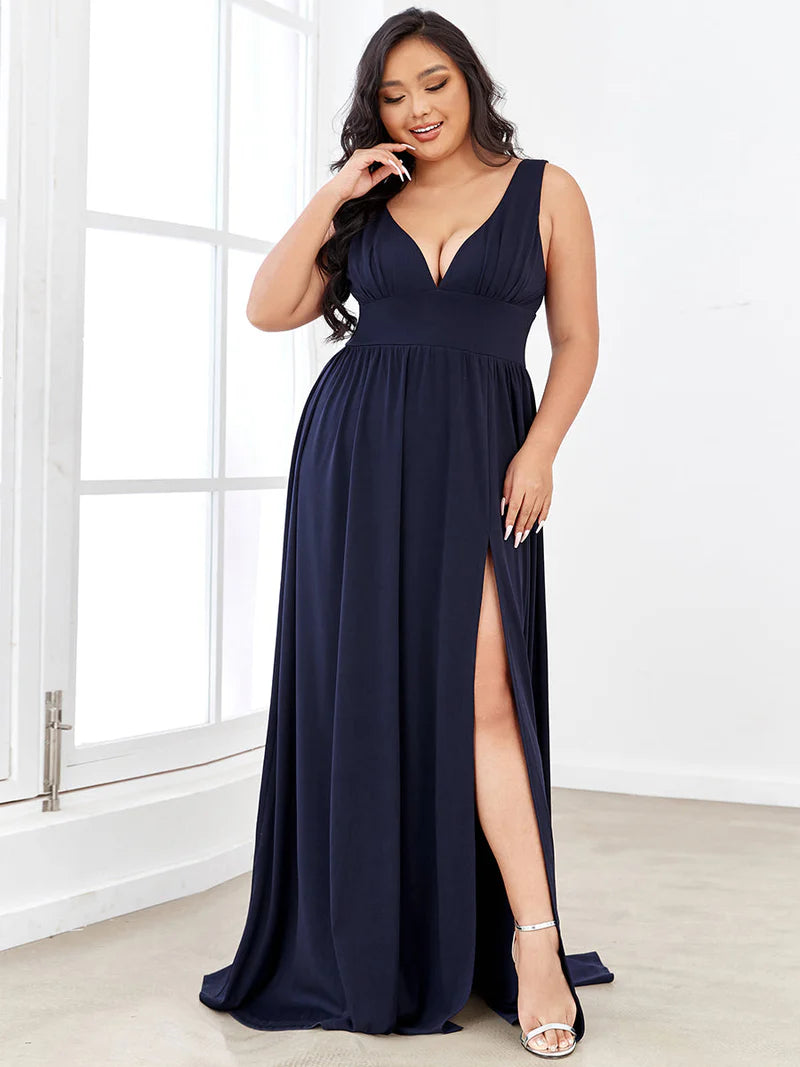 Plus sized navy blue formal dress with sleeveless and deep v-neck.