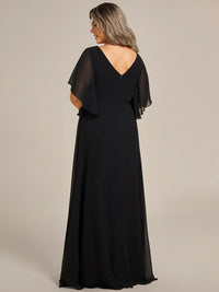 Black embroidered mother of the bride or bridesmaid chiffon sleeve dress.