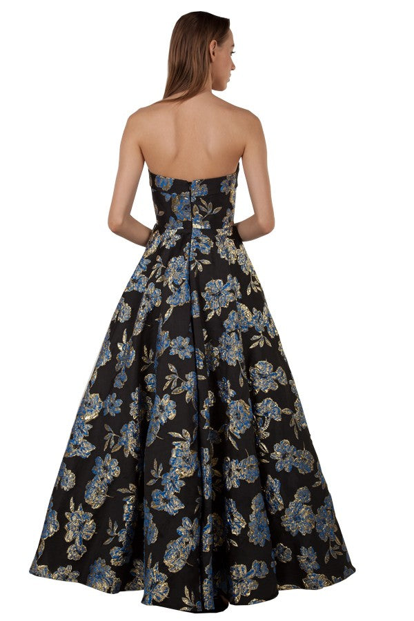 Floral brocade strapless plus size formal dress in vibrant blue gold & black.