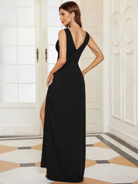 Black formal dress with deep v neck and split.