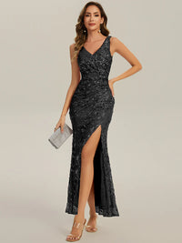 Black formal dress with deep v neck and a split.