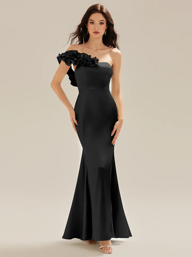 Black strapless formal dress with fishtail and ruffles.