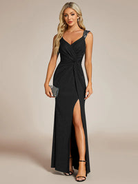 Black formal dress with glitter and split front.