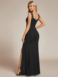 Black formal dress with glitter and split front.