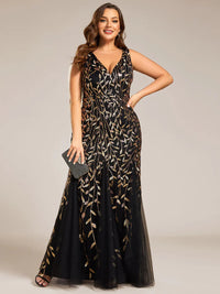Black and gold plus sized dress with fishtail and sequin.