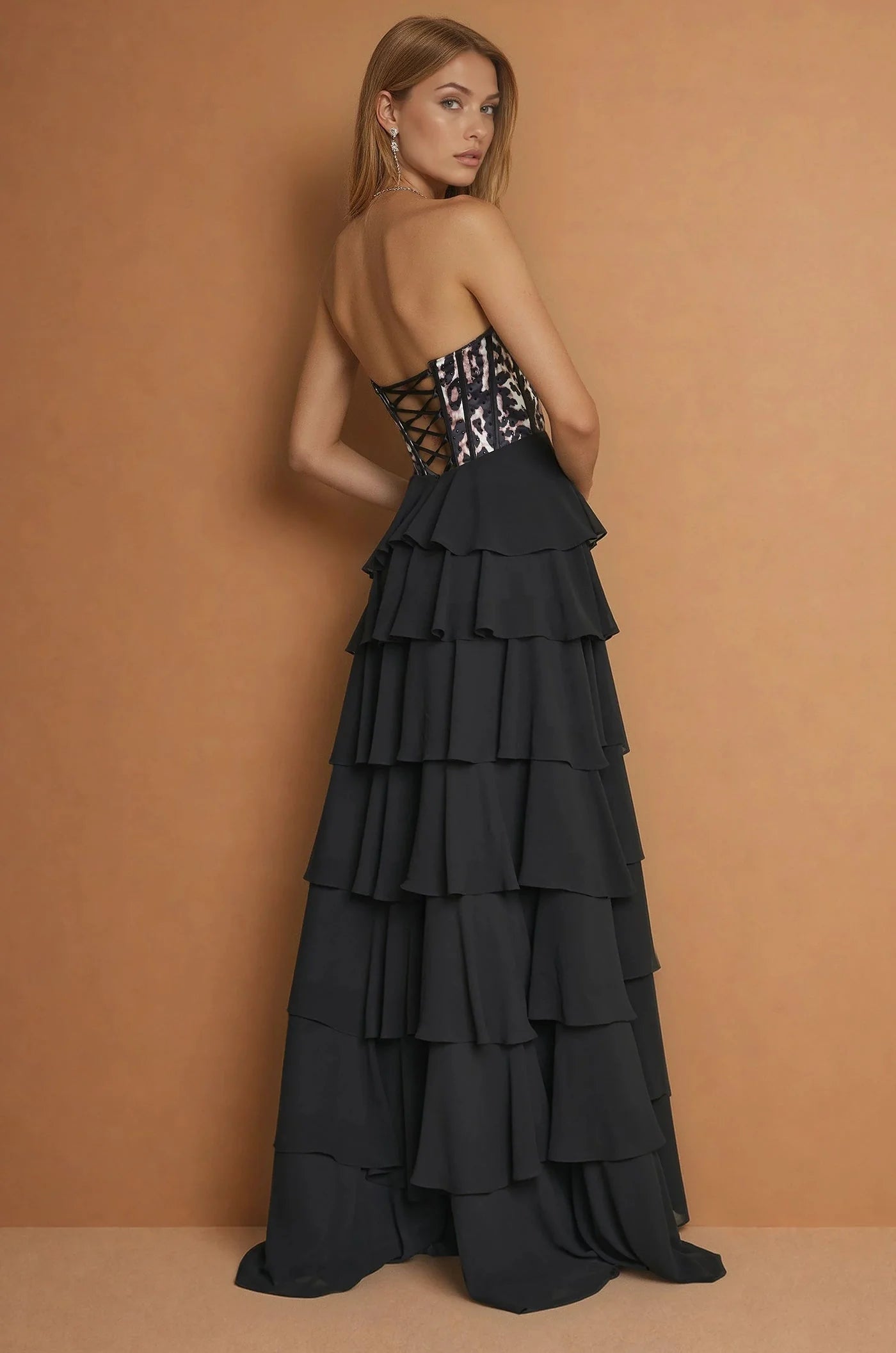 Black leopard print formal dress with chiffon ruffle skirt and split.