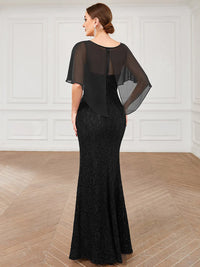 Black Mother of the Bride dress with fishtail finish, lace with chiffon cape ruffle sleeves. Graceful Elegance bridal shop services Logan, Brisbane, Gold Coast, Scenic Rim.