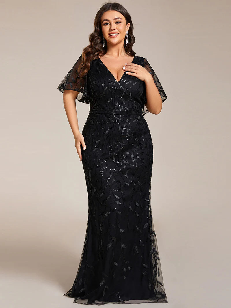 Black Plus Size Mother of the bride dress with tulle, sequins and lace ruffle sleeves.