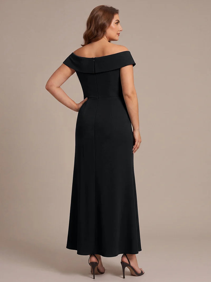 Black plus size formal dress with ruffle design and off shoulder style.