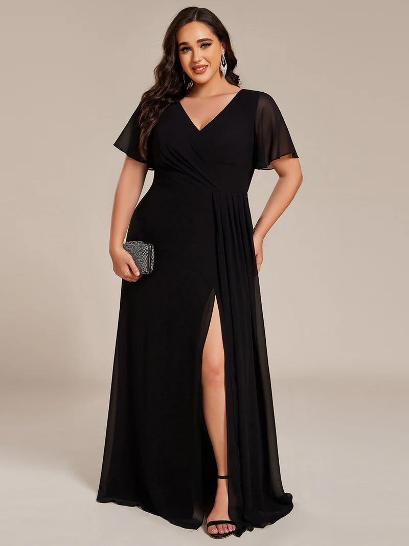 Black plus size formal dress with sleeves and a hidden split.