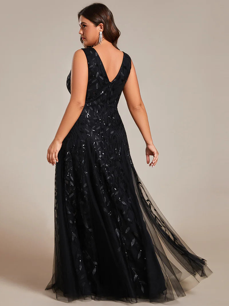 Black plus size formal dress with tulle and lace.