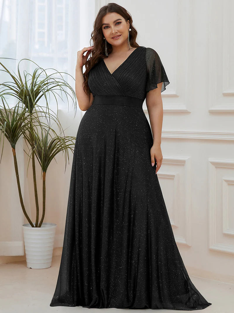 Black shimmer plus size formal dress with satin band.