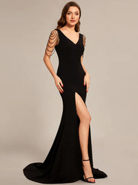 Black sleeveless beaded v neck mermaid tail formal dress. Graceful Elegance Bridal Shop services Logan, Brisbane, Gold Coast, Scenic Rim.