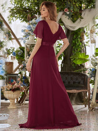 Burgundy bridesmaid dress or formal dress in chiffon with satin band and short sleeves.