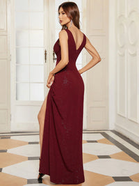Burgundy formal dress with deep v neck and split.