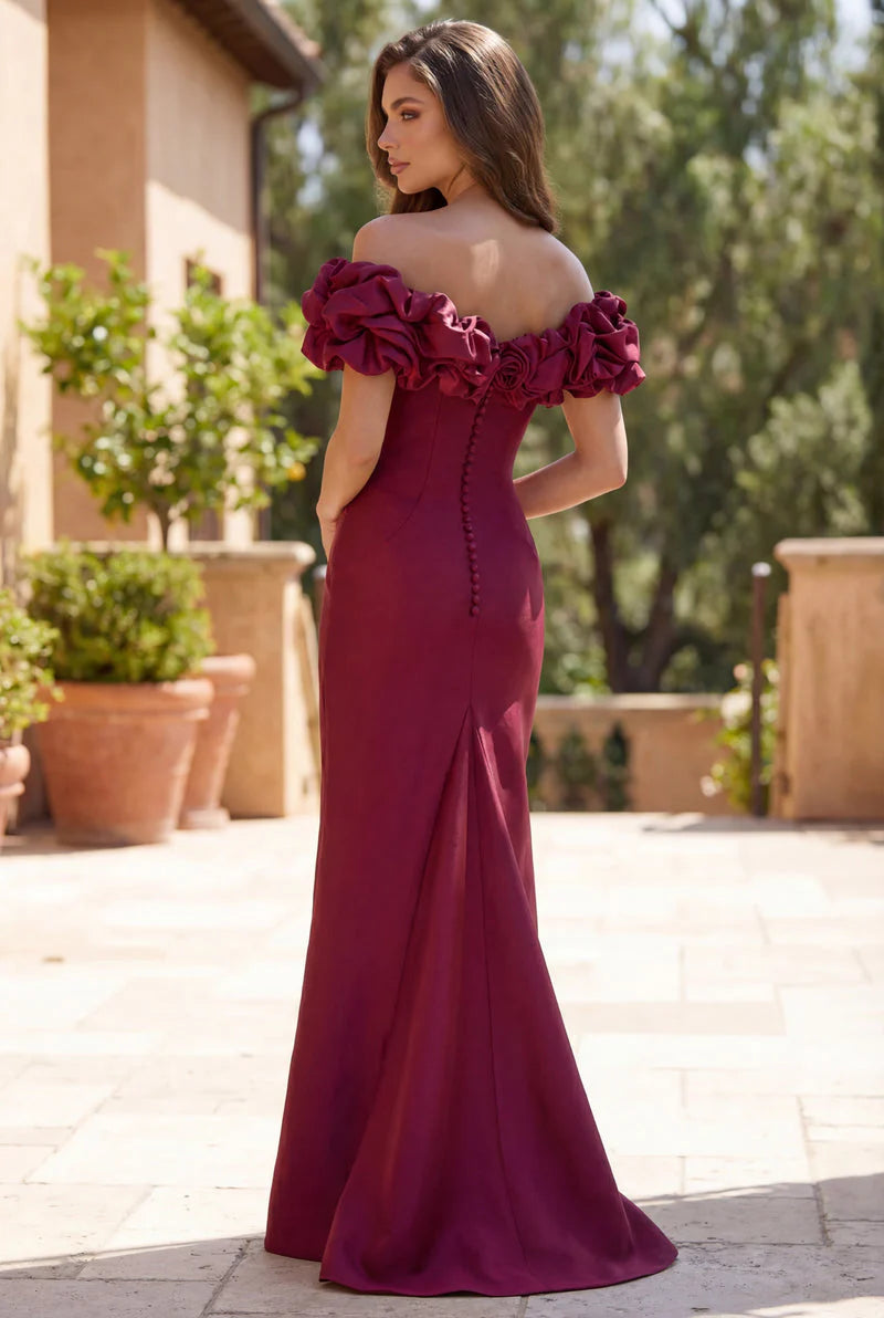 Burgundy off the shoulder ruffle sleeve formal dress with button detail on the back.