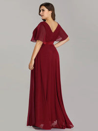 Burgundy plus size bridesmaid dress or formal dress in chiffon with short sleeves and a satin band.