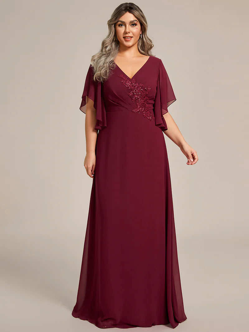 Burgundy red embroidered mother of the bride or bridesmaid chiffon sleeve dress.
