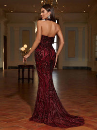 Burgundy red halter neck sequin formal dress with low back and mermaid tail finish. Graceful Elegance services Logan, Brisbane, Gold Coast, Scenic Rim.
