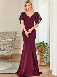 Burgundy red formal or mother of the bride dress with lace sleeves,v-neck and fishtail.