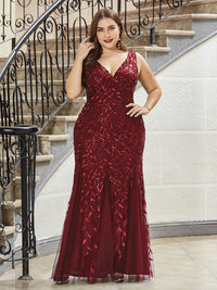 Burgundy red plus sized dress with fishtail and sequin.