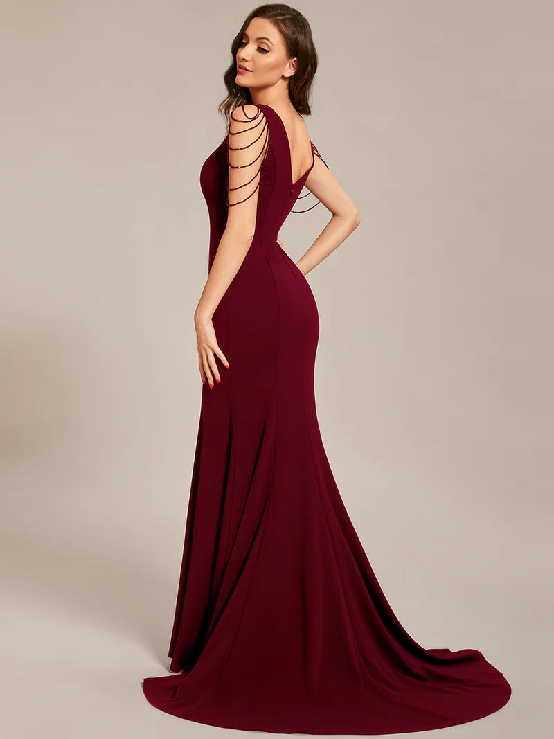Burgundy red sleeveless beaded v neck mermaid tail formal dress. 