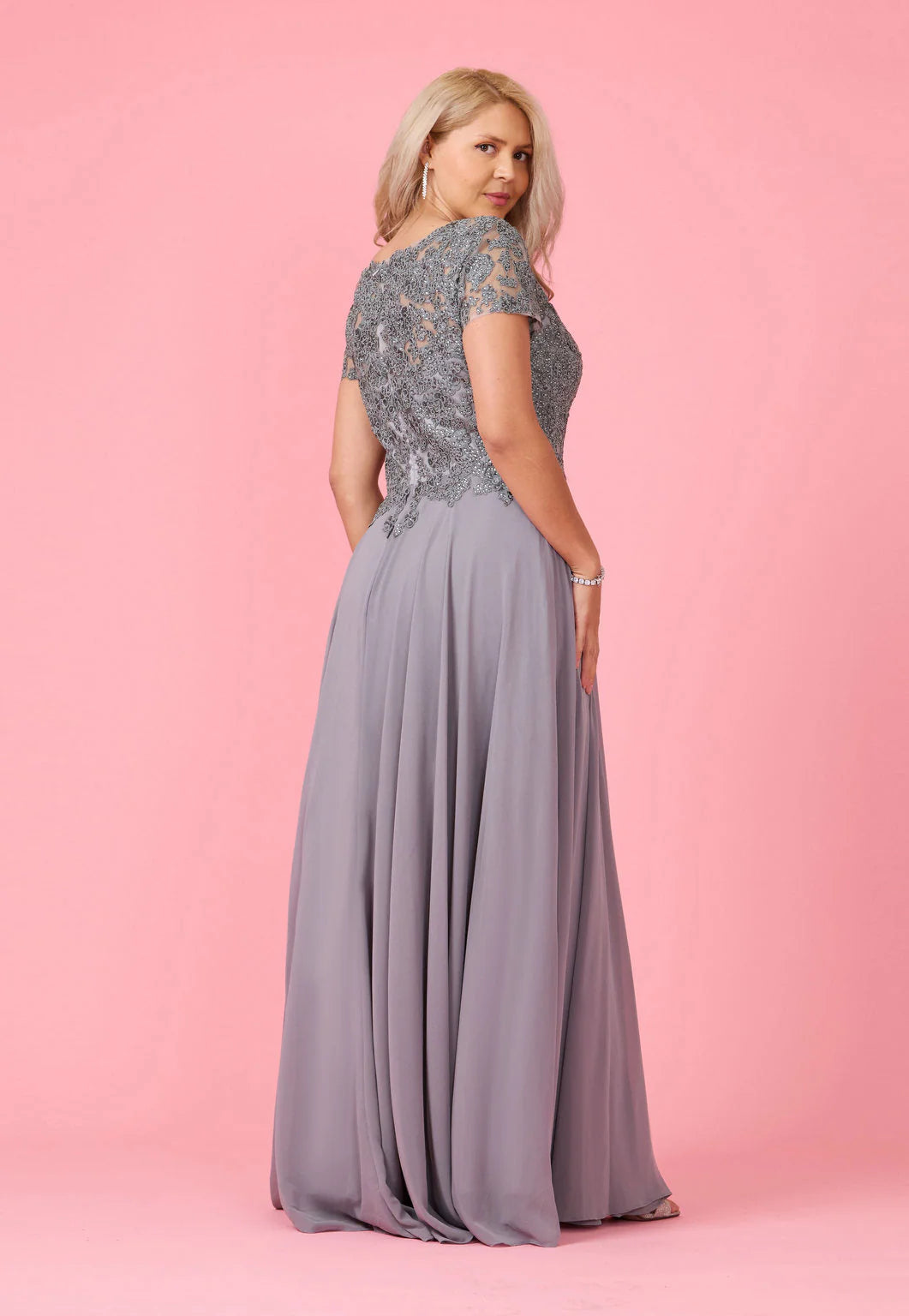 Charcoal grey Mother of the Bride dress with short lace sleeves and chiffon skirt.