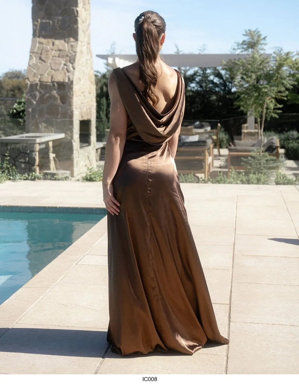 Chocolate satin sheath formal dress with cowl back.