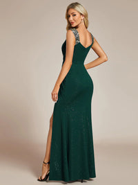 Dark green formal dress with glitter and split front.